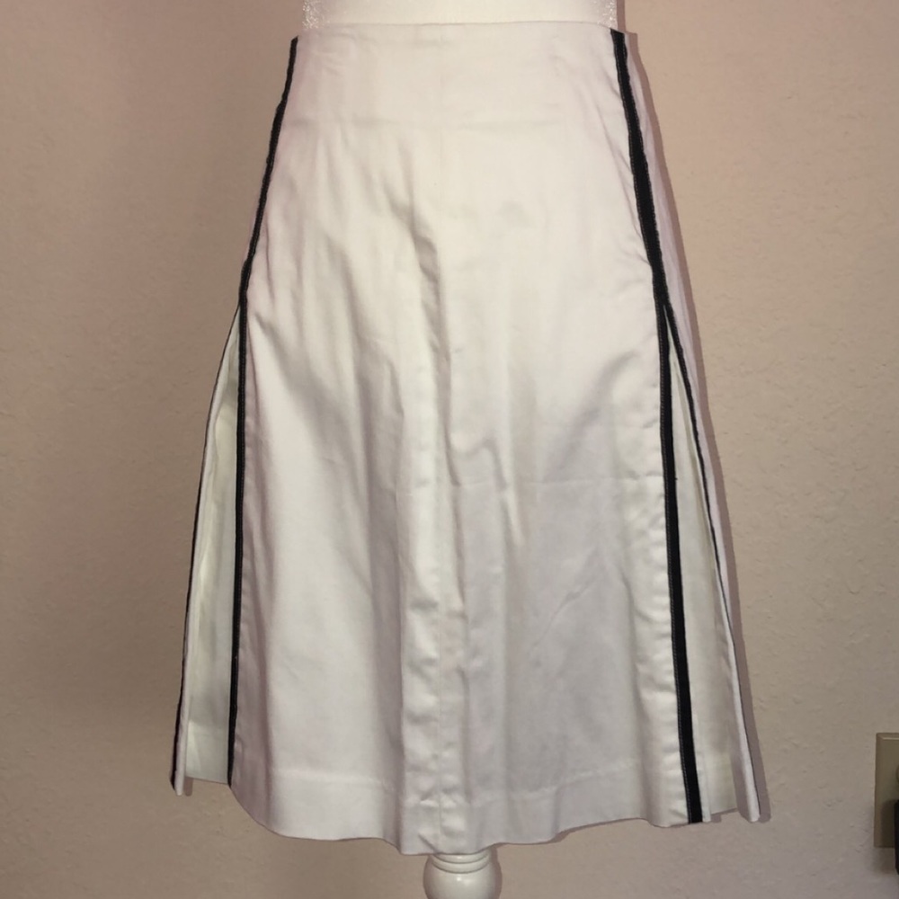 White skirt with black stripe